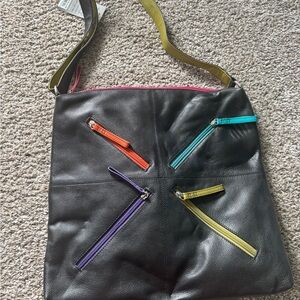 Black and Orange Crossbody Bag with Vibrant Zipper Accents